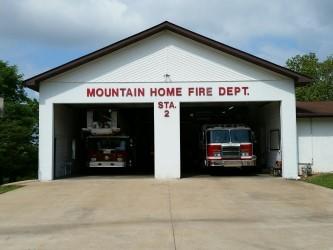 Mountain Home fire department station on Sunset Drive, with 2 fire trucks in the bays